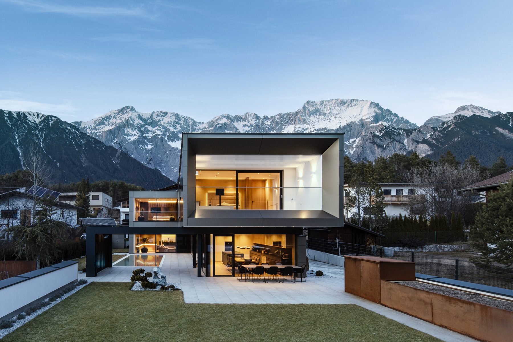Contemporary mountain home with floor-to-ceiling Internorm glazing
