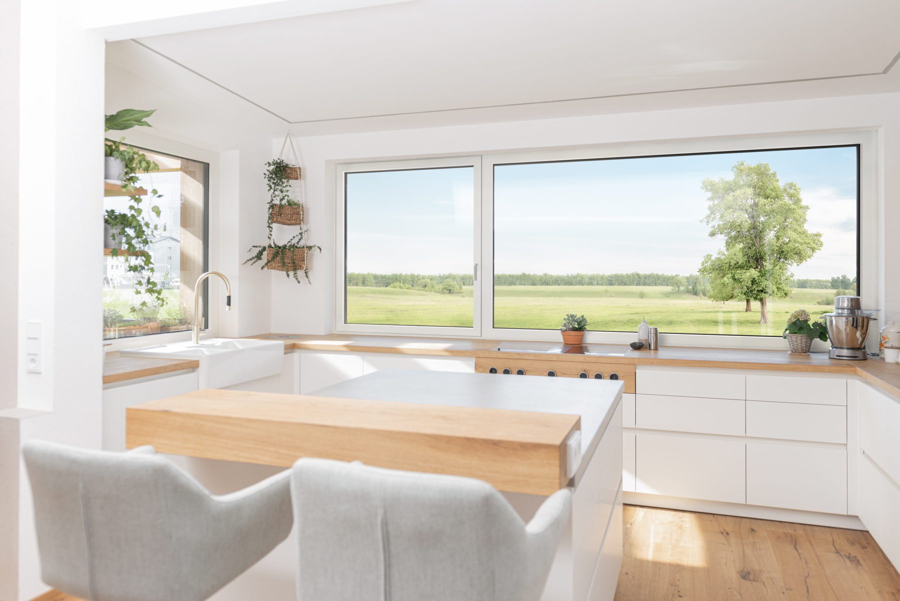 Bright kitchen with large tilt and turn windows